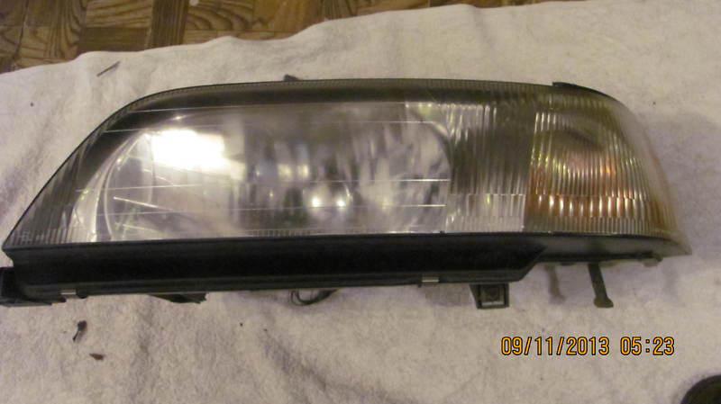 97 98 infiniti q45 & q45t driver side / lh head light assembly