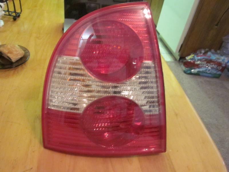 01 02 03 04 05 b5.5 sedan rear taillight left driver side with bulbs oem