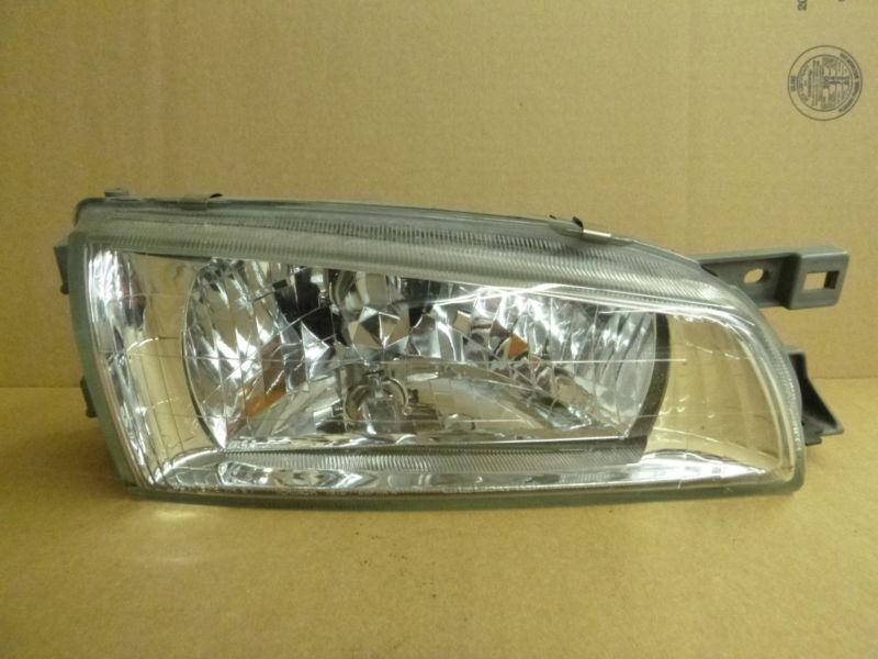 1993 - 2000 subaru impreza headlight assembly (oem) used right side