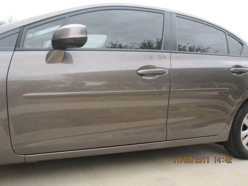 Painted honda civic 4 door body side moldings  2012