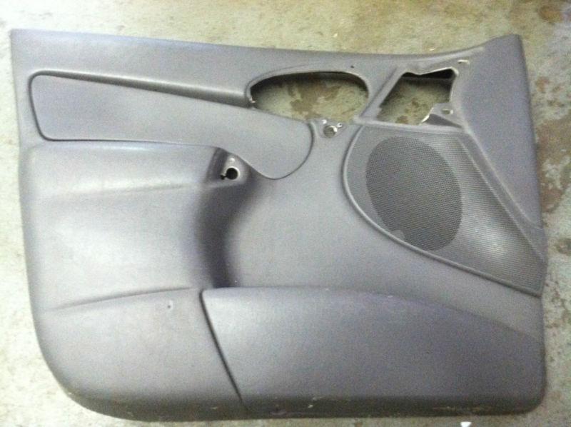 2000-2004 ford focus sedan front driver side door panel (used) 