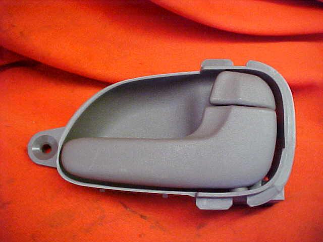 02 01 00 99 mercury villager right front door handle interior inside