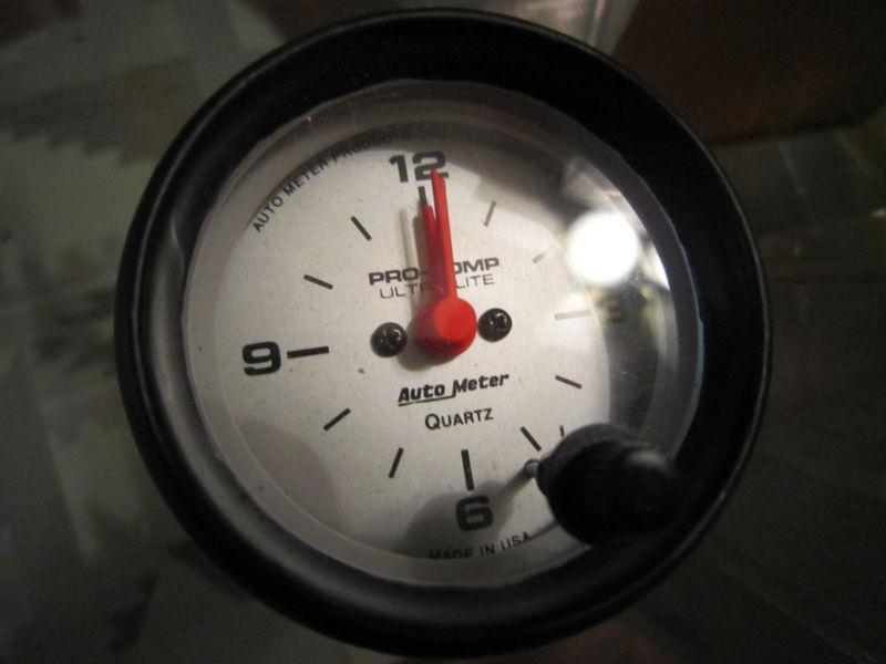 Auto meter gauge 2 1/16 ultra lite analog clock 4385