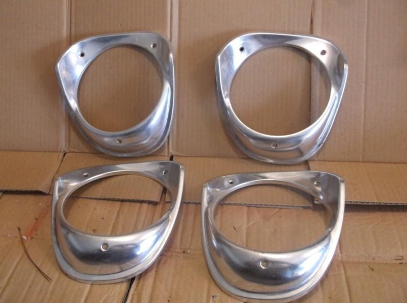 1963 chevy impala headlight bezels nice set