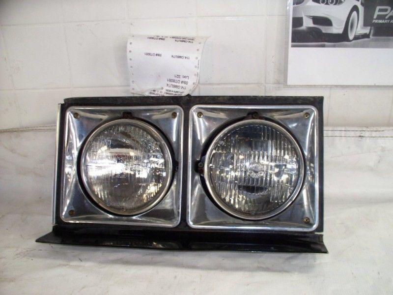 74 cadillac fleetwood headlight head lamp left l. lh driver oem factory