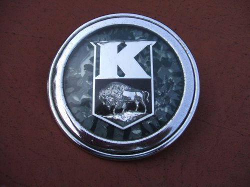 1947-1948 kaiser horn button with chrome buffalo mascot on green background