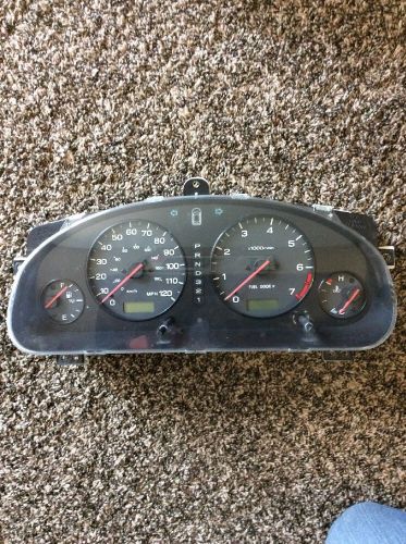 2000 legacy speedometer cluster mph a/t w/ tach 2.5l 4 cyl 850 12ae 61a