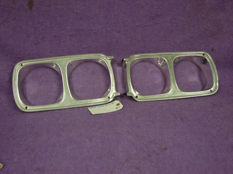 1969 plymouth roadrunner headlight bezels (pair) mopar