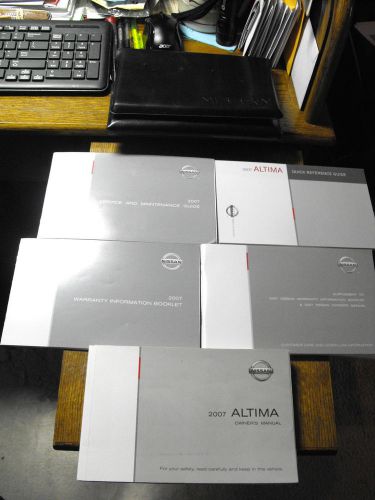 ~2007 nissan altima owners manuals~~assorted ~see pics~ with case~~free shipping