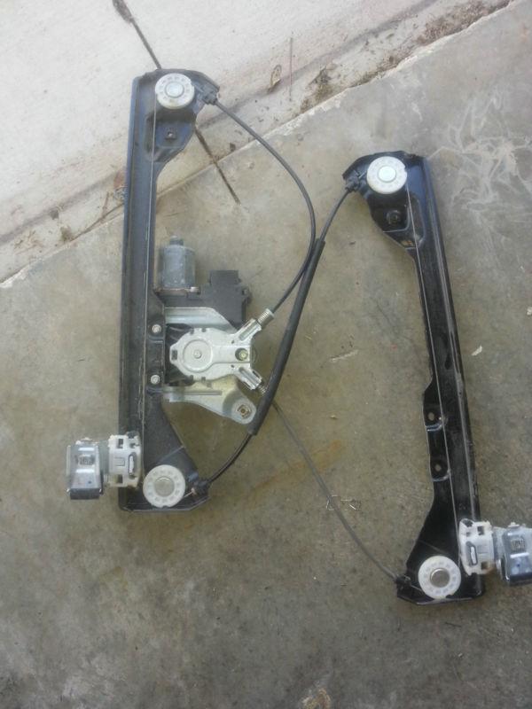 2010 cadillac cts window regulator