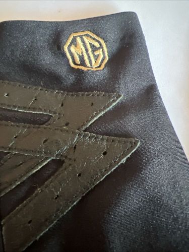 Mg branded driving gloves