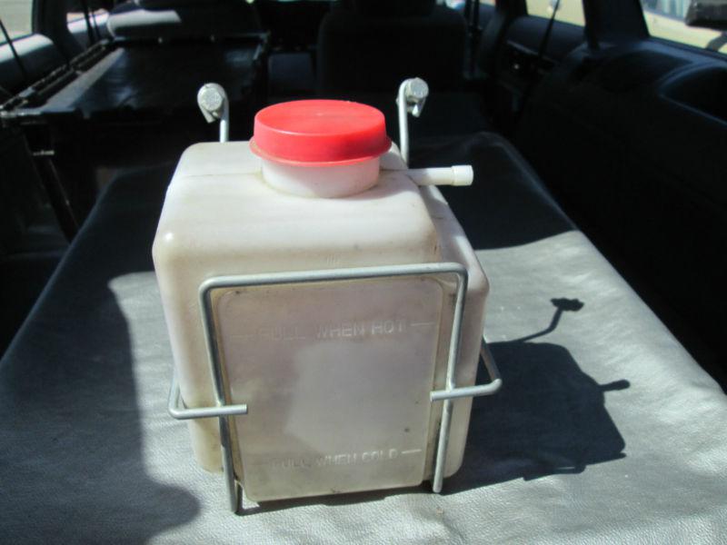 Vintage radiator coolant recovery tank with metal mounting cage-made in usa