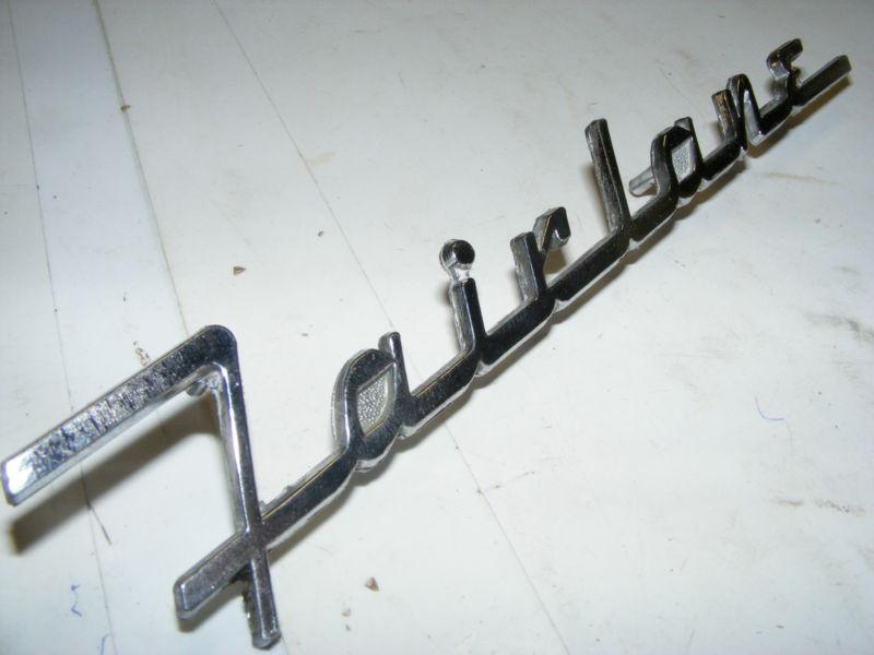 1955 ford fairlane qtr panel body side emblem name plate badge 