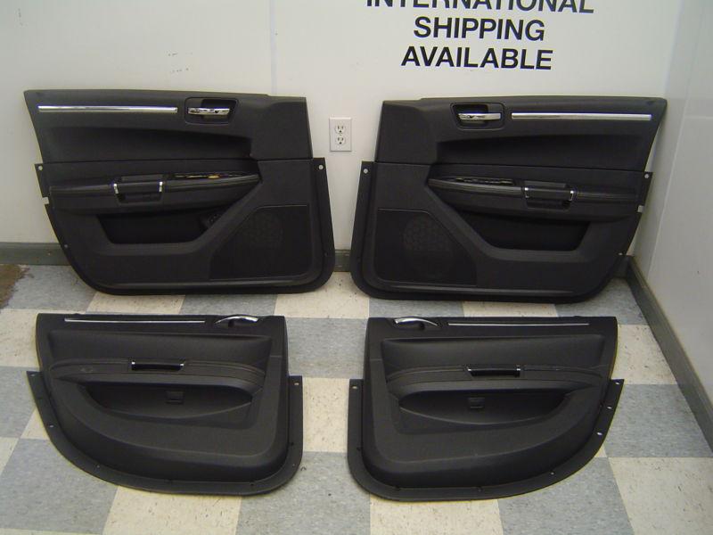 05-10 chrysler 300 300c srt-8 oem lh rh front & rear door trim panels black 