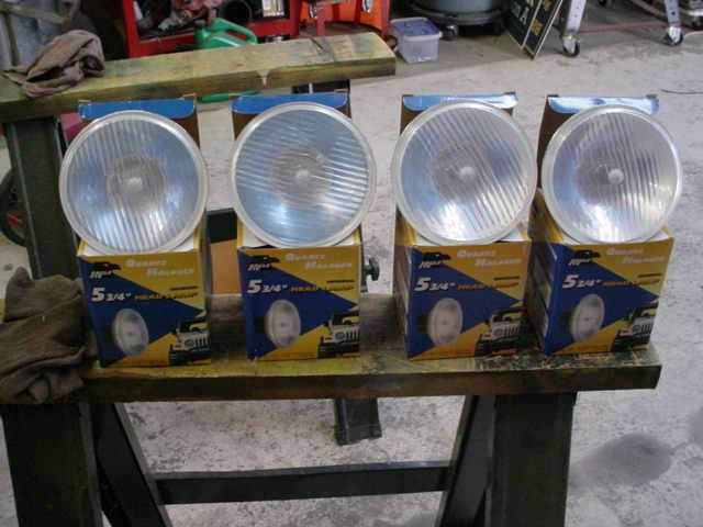 4  new  5 3/4"  replacement  halogen  headlights