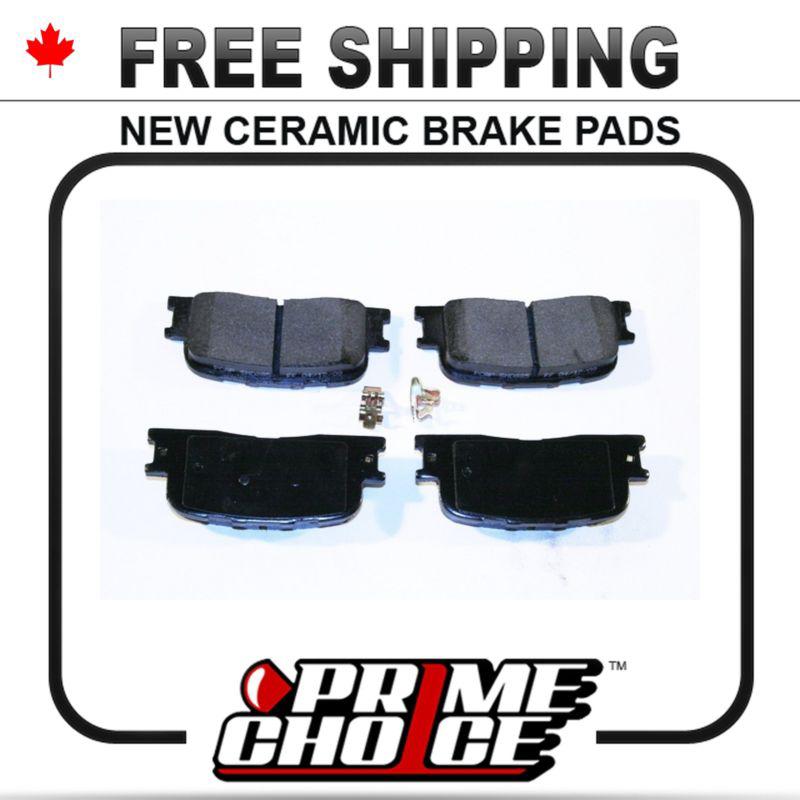 New premium complete set of rear ceramic disc brake pads with shims