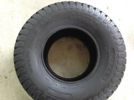 Multi-trac c/s 26x12-12 nhs tire 4 ply