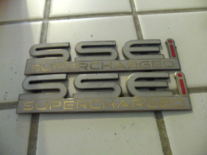 "ssei" pontiac bonneville supercharger emblems (2)  1990's?