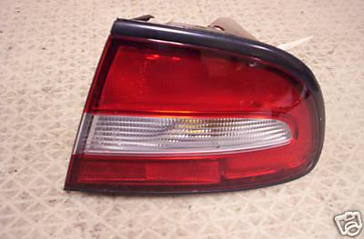 1994-95-1996 mitsubishi galant tail light passenger side ( right ) free s/h oem