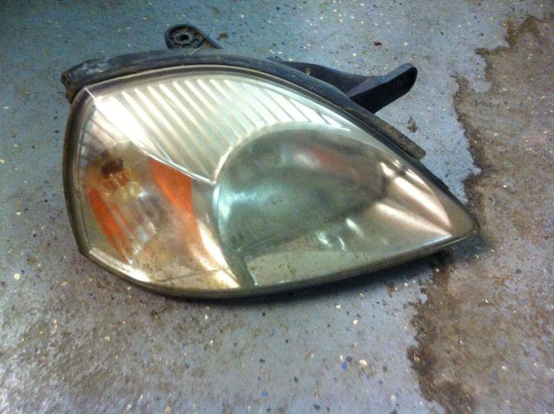 2004 kia rio passenger side headlight 