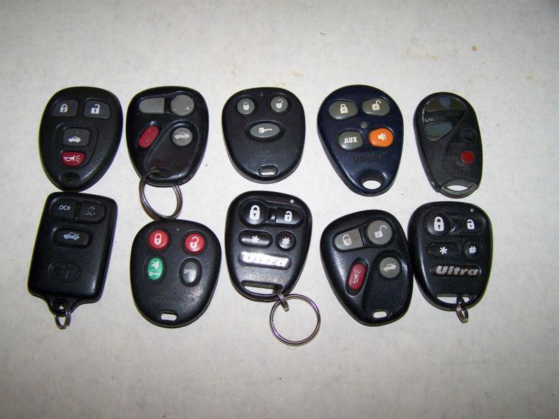 Assorted keyless entry fobs - used - lot of 10