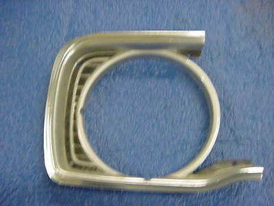 Duster valiant 70's era nos head light bezel