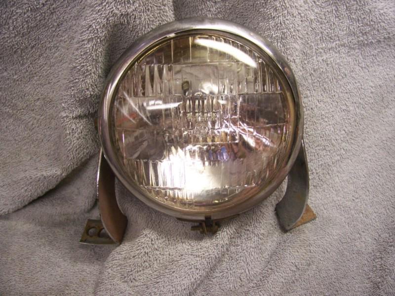 Vintage bates headlight with side mounting bracket chopper panhead knucklehead