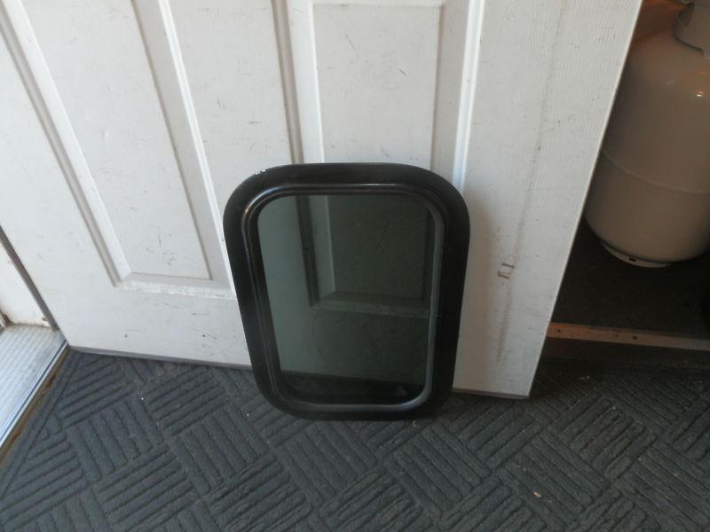 Rv tinted solid window r.o. 20" tall x 12" wide ( used )