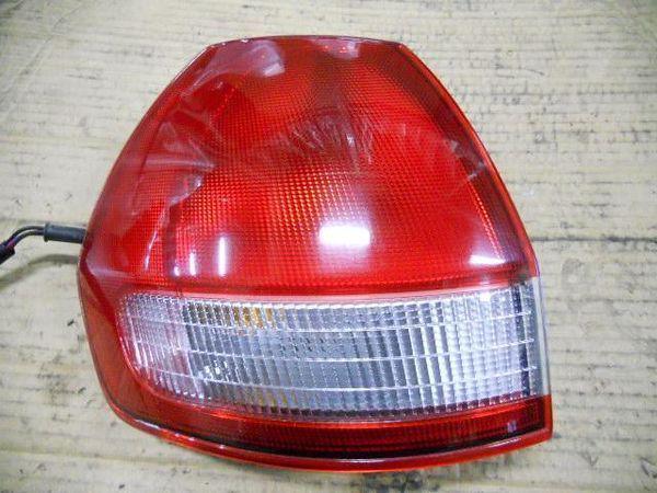 Nissan wingroad 2000 rear left combination lamp [7115600]