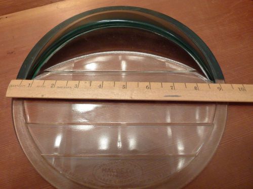 Antique collector car part spectacular headlight lens with a green eyebrow