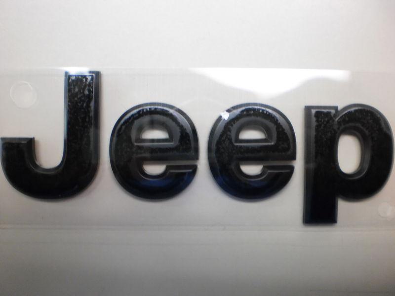 Jeep wrangler jk front hood nameplate oem factory new black 68185492aa emblem