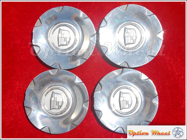 Set of 4 used cadillac oem factory center caps