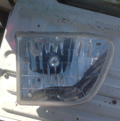 Ford mercury mountaineer drivers (left) head light 1998 thru 2001 oem