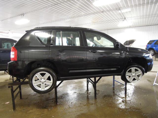 2010 jeep compass 24047 miles front door right