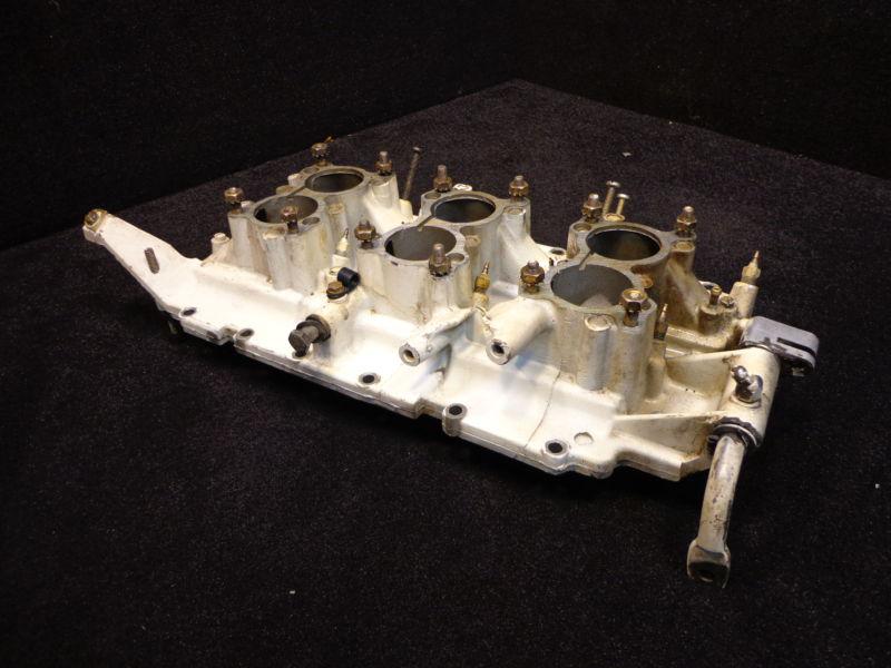 Used intake manifold # 0325558 #325558 johnson/evinrude/omc outboard motor part