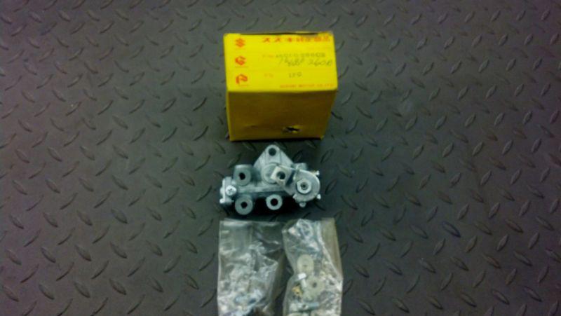 1974-76 tm75 75-77 ts75 suzuki oil pump assembly 16100-26010  16000-268c2 nos oe