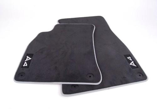 Audi a4 oem carpeted floor mat set - sabre (black) set of 4 2009+