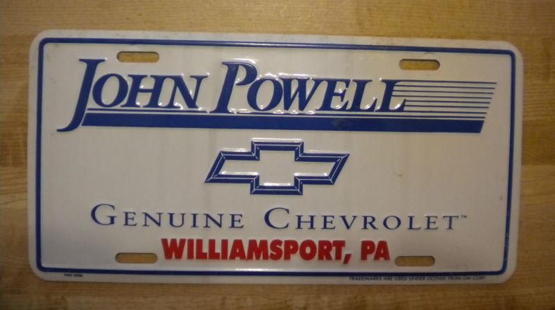 John powell chevrolet dealer booster license plate metal chevy williamsport pa