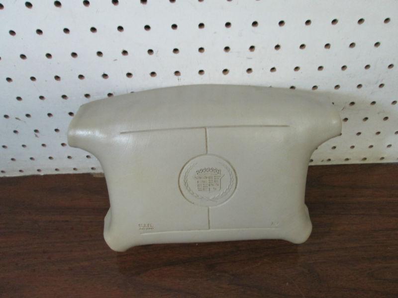 (673) 97 98 99 cadillac deville driver air bag white