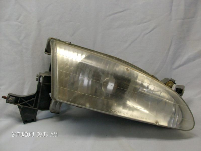 98 99 00 toyota corolla right passenger headlight (fits 1999)