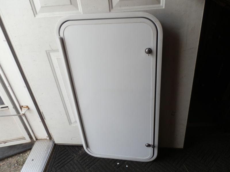 Rv cargo door r.o. 36" tall x 18" wide x 1 1/2" thick ( used )