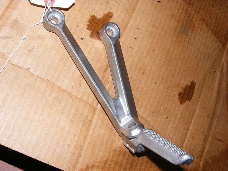 04 kawasaki zx10 rear foot bracket left