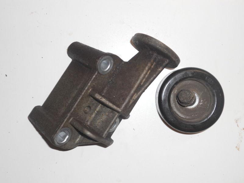 Idler pully with bracket gm envoy trailblazer bravada rainier nr oem 24577514