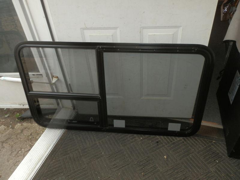 Rv black tinted 3 tier window r.o. 48" x 26"  