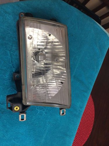 Toyota 4runner 99-02 right front headlight assembly genuine oem