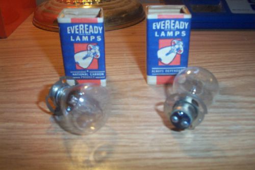 2 nors automotive headlight bulbs (12-16 volt)  #1026