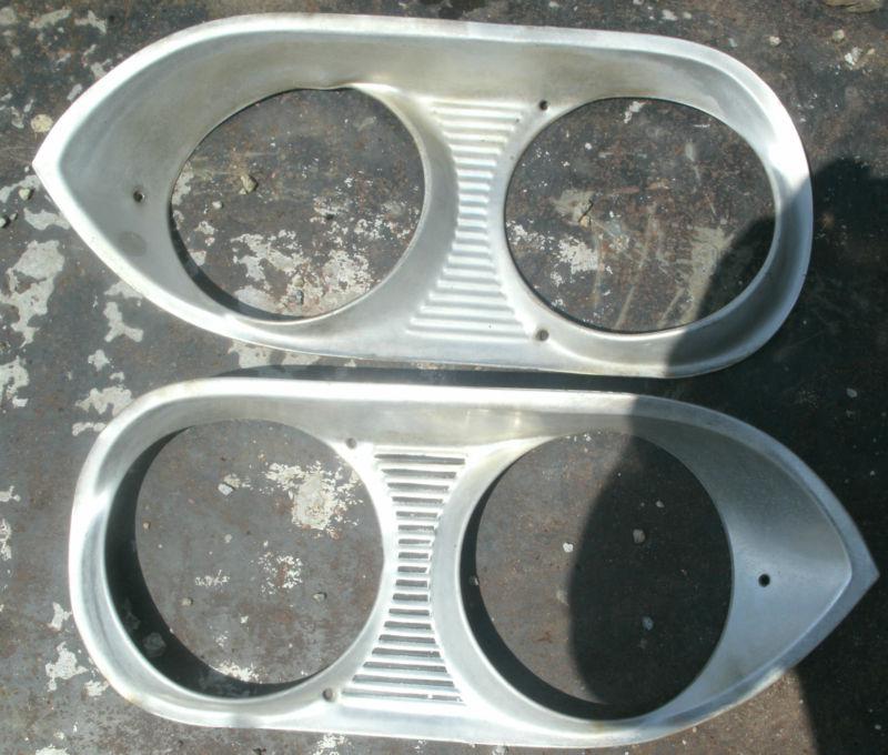 1966 66 67 68 69 chevy chevrolet corvair monza headlight bezels pair lh rh oem