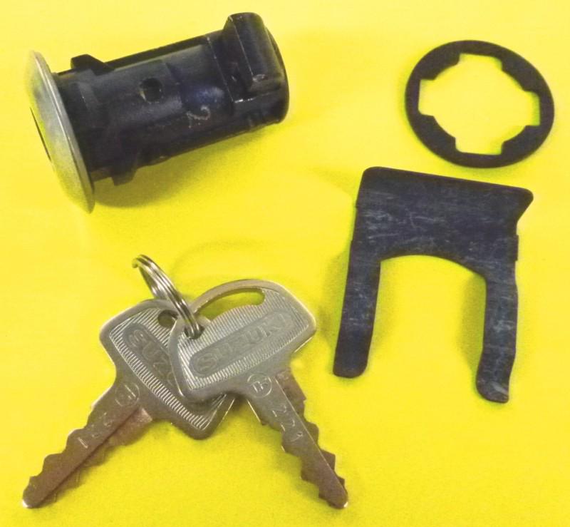 New fuel tank cap access door cover lock re5 & 76-77 gt750 genuine suzuki  e0060