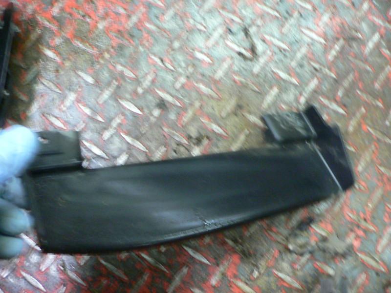 84 pontiac fiero right lower headlight trim part