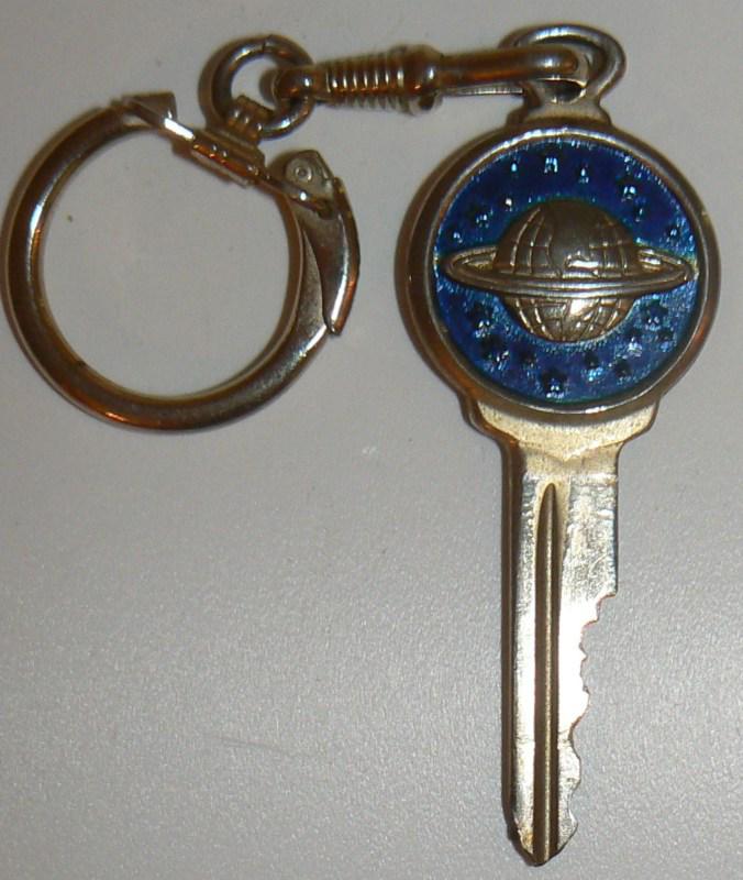 Vintage oldsmobile key on chain globe yellow gold crest keychain fob